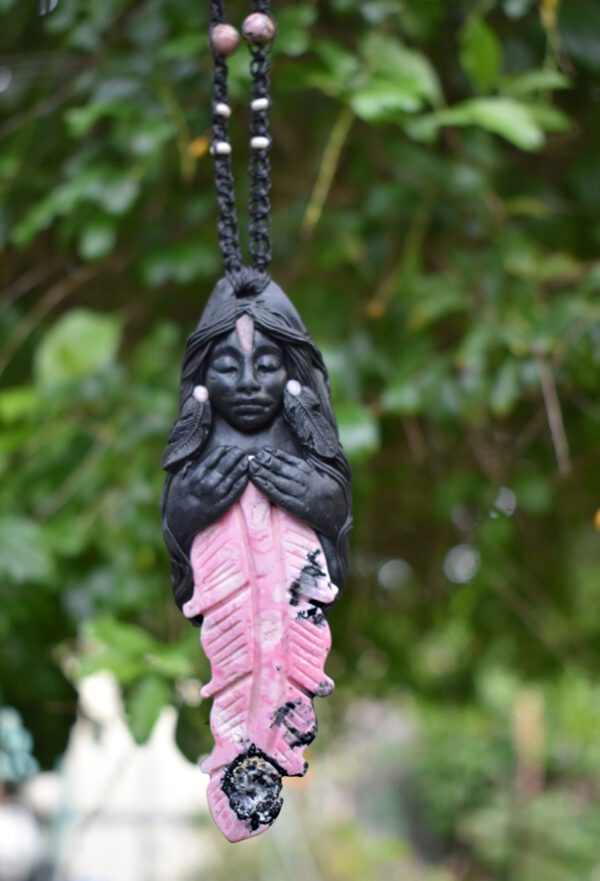 Black Goddess with carved Feather